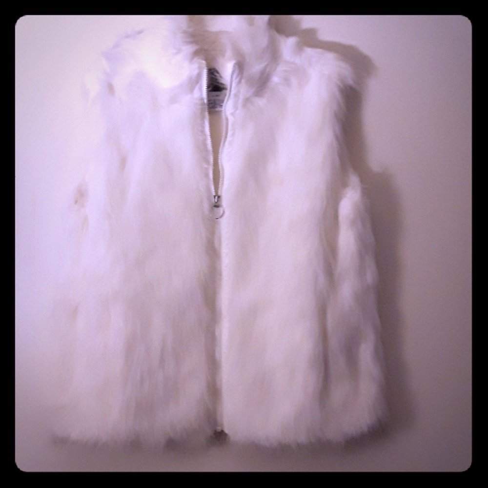 White fur vest